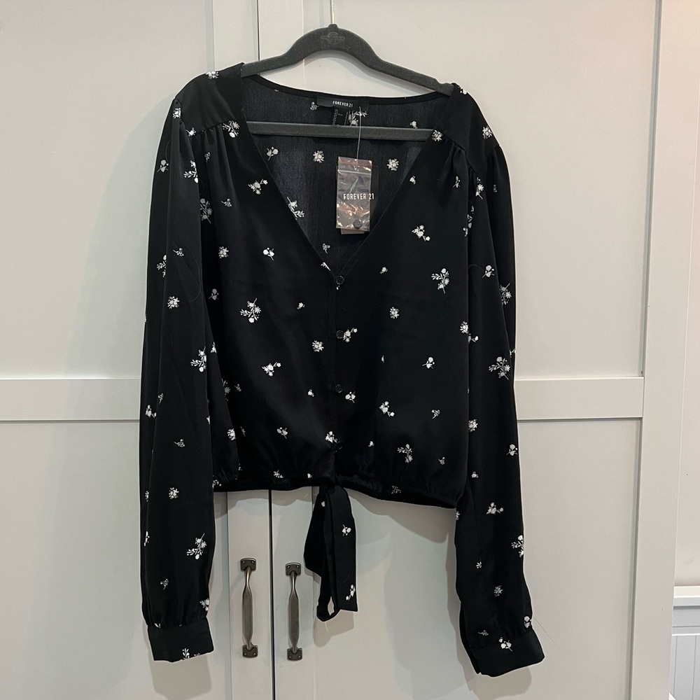 Women’s black and white floral button down top
